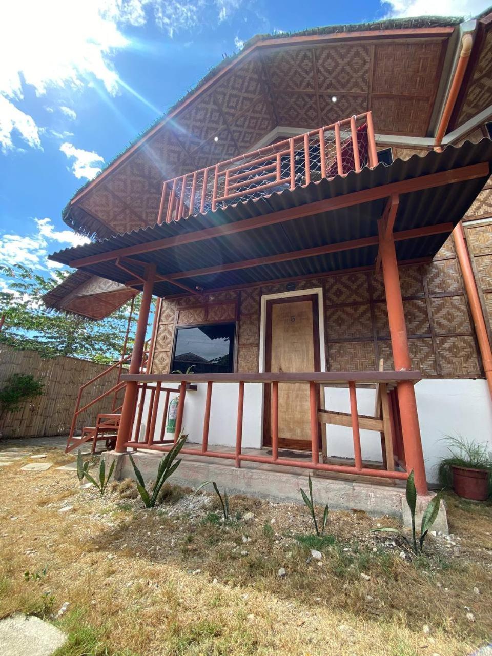 Moalboal Panagsama Beach Topbudz Hostel Bagian luar foto